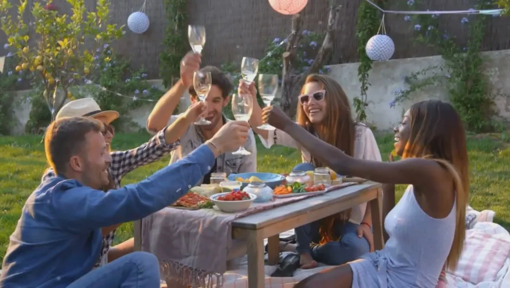 Romantic couple tasting white wine at vineyard